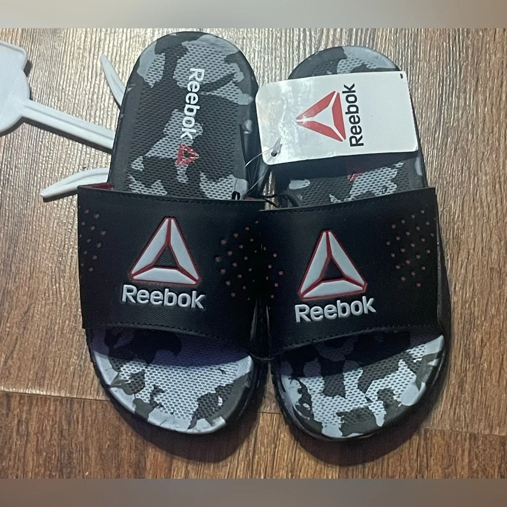 Reebok slides featuring